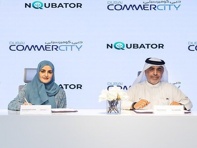 Amna-Lootah-and-Saeed-Al-Hamli-Signing.jpeg